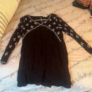 Cute size medium long sleeved dress.